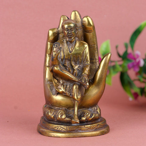 Pure Brass Shirdi Sai on Hand Statue – Divine Brass Idol of Sai Baba, Symbolizing Faith, Devotion, and Blessings, Perfect for Temple, Home Decor, and Spiritual Worship, Handcrafted with Intricate Detailing for a Sacred Aura, Ideal for Puja and Mandir Decoration. | India’s Largest Pooja Accessories Brand – www.satvikworld.com